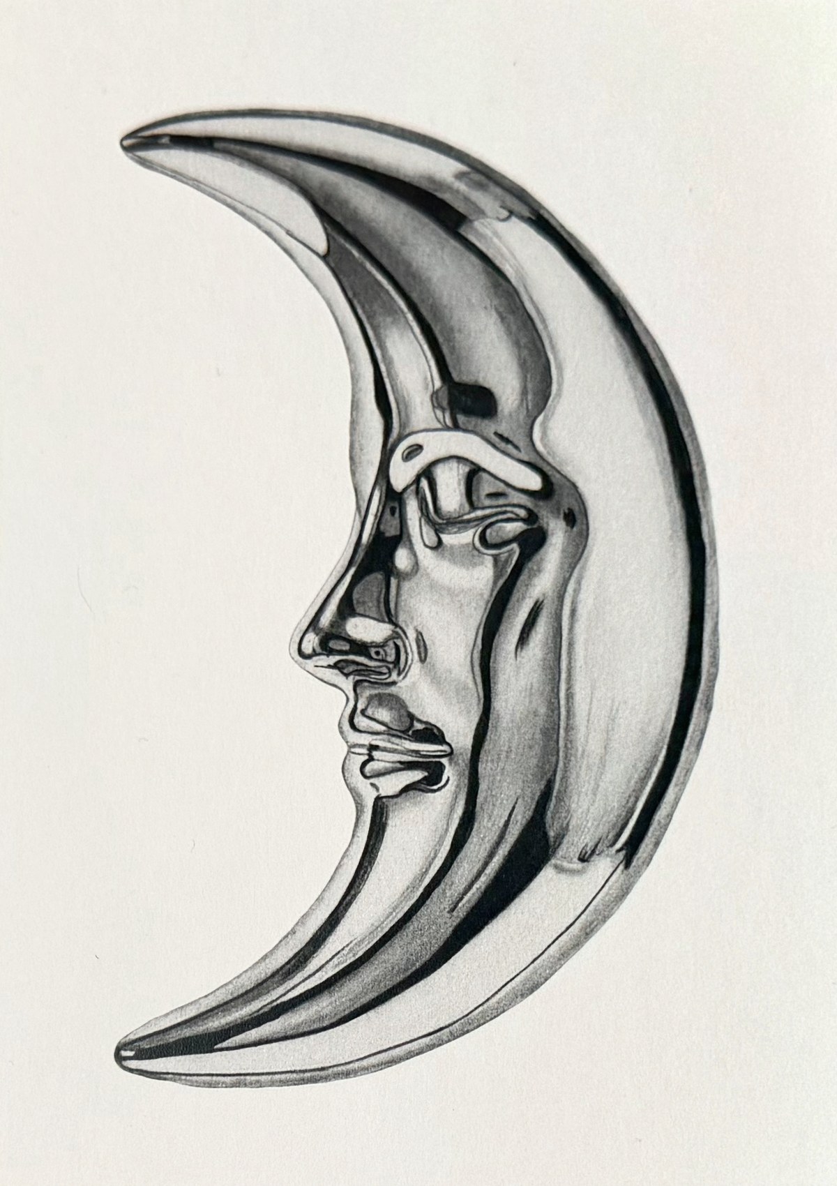 A crescent moon with a face, graphite drawing on paper